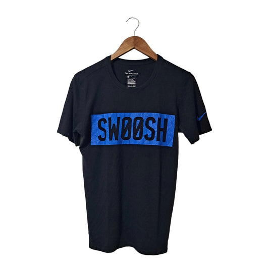 Black Nike tee with blue 'SWOOSH' graphic
Dri-Fit
Athletic cut